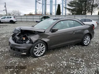 2015 Volkswagen Eos Komfort with VIN WVWBW8AH3FV000399, listed as a Copart auction lot 81398264 with 82,533 mi miles and Salvage Title. Bid and sale history available at DreamBid. Image 1.