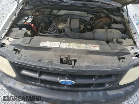 1997 Ford F-150 z VIN 1FTDF1727VNC35289, wystawiony jako Copart lot #54521915 z przebiegiem 148 171 mil mil oraz Szkoda całkowita • Salvage title. Historia ofert i sprzedaży dostępna na DreamBid. Obrazek 11.