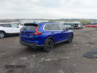 2025 Honda CR-V Sport Touring with VIN 2HKRS6H99SH807839, listed as a IAAI auction lot 42029547 with 5,979 mi miles and . Bid and sale history available at DreamBid. Image 4.