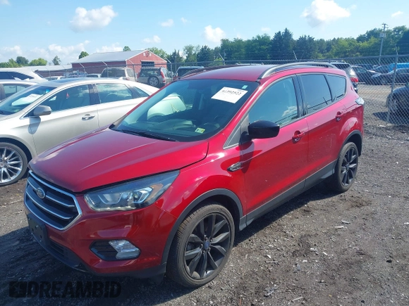 2017 Ford Escape SE z VIN 1FMCU9GD4HUA10240, wystawiony jako IAAI lot #42392522 z przebiegiem 82 325 mil mil oraz . Historia ofert i sprzedaży dostępna na DreamBid. Obrazek 17.