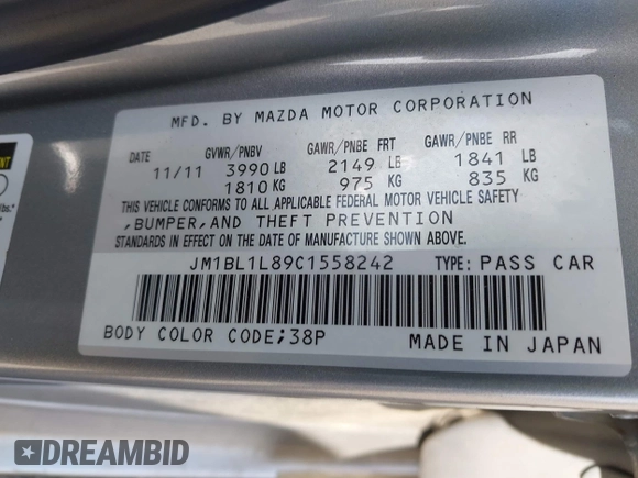 2012 Mazda Mazda3 i Touring with VIN JM1BL1L89C1558242, listed as a IAAI auction lot 42057513 with 112,094 mi miles. Bid and sale history available at carsss.com. Image 9.