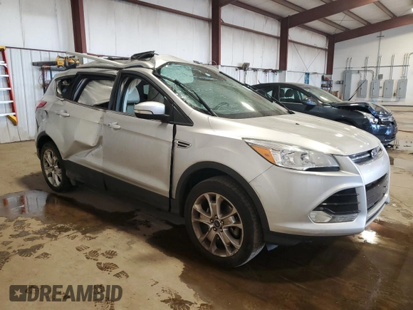 2016 Ford Escape Titanium with VIN 1FMCU9J9XGUC49553, listed as a Copart auction lot 54850245 with Not Provided miles and Salvage Title. Bid and sale history available at DreamBid. Image 4.