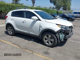 2013 Kia Sportage LX with VIN KNDPB3A23D7514304, listed as a IAAI auction lot 42544397 with 82,456 mi miles and . Bid and sale history available at DreamBid. Image 1.