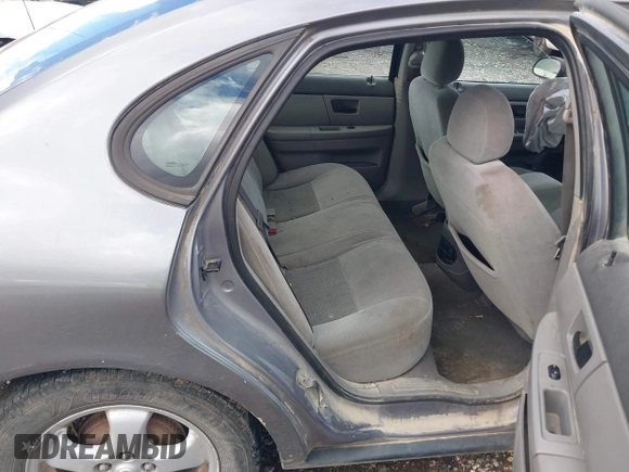 2006 Ford Taurus SE with VIN 1FAFP53U06A253233, listed as a IAAI auction lot 41695528 with 1 mi miles. Bid and sale history available at carsss.com. Image 8.