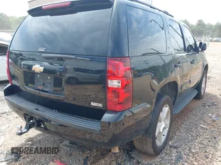 2007 Chevrolet Tahoe LT z VIN 1GNFK13057R237666, wystawiony jako IAAI lot #42271427 z przebiegiem 164 029 mil mil oraz . Historia ofert i sprzedaży dostępna na DreamBid. Obrazek 4.