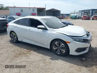 2018 Honda Civic EX-T z VIN 19XFC1F3XJE004123, wystawiony jako IAAI lot #42090933 z przebiegiem 81 228 mil mil oraz . Historia ofert i sprzedaży dostępna na DreamBid. Obrazek 1.
