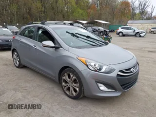 2014 Hyundai Elantra GT with VIN KMHD35LH6EU165019, listed as a IAAI auction lot 42016057 with 121,794 mi miles. Bid and sale history available at carsss.com. Image 1.