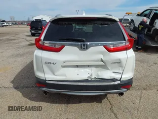 2017 Honda CR-V Touring with VIN 5J6RW2H95HL044505, listed as a IAAI auction lot 41856975 with 117,826 mi miles. Bid and sale history available at carsss.com. Image 16.