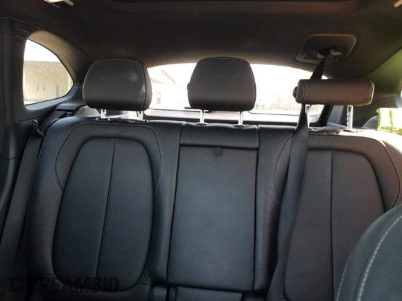 2018 BMW X1 xDrive28i with VIN WBXHT3C33J5K31838, listed as a Copart auction lot 48650943 with 63,064 mi miles and . Bid and sale history available at DreamBid. Image 10.