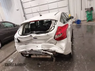 2014 Ford Focus Titanium with VIN 1FADP3N27EL110287, listed as a IAAI auction lot 42210697 with 107,741 mi miles and . Bid and sale history available at DreamBid. Image 16.