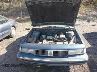 1993 Oldsmobile Cutlass Ciera S with VIN 1G3AG55N5P6317040, listed as a IAAI auction lot 41777055 with 208,984 mi miles and . Bid and sale history available at DreamBid. Image 10.