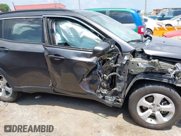 2019 Jeep Compass Latitude with VIN 3C4NJCBB1KT833007, listed as a IAAI auction lot 42401265 with 106,973 mi miles and . Bid and sale history available at DreamBid. Image 13.