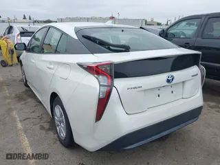 2016 Toyota Prius Two with VIN JTDKBRFU2G3503863, listed as a IAAI auction lot 42035013 with 118,930 mi miles. Bid and sale history available at carsss.com. Image 3.