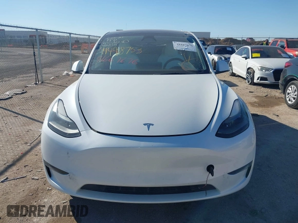 2023 Tesla Model Y Performance with VIN 7SAYGDEF1PF864976, listed as a IAAI auction lot 41667676 with Not Provided miles and . Bid and sale history available at DreamBid. Image 11.
