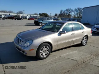 2005 Mercedes-Benz E 320 with VIN WDBUF82J55X170453, listed as a Copart auction lot 87760515 with 156,575 mi miles and Salvage Title. Bid and sale history available at DreamBid. Image 1.