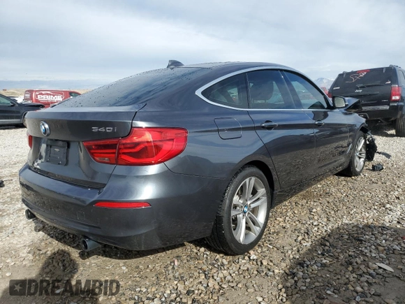 2018 BMW 3 Series 340i xDrive with VIN WBA8Y3C53JG451305, listed as a Copart auction lot 44239415 with 56,642 mi miles and Salvage Title. Bid and sale history available at carsss.com. Image 3.