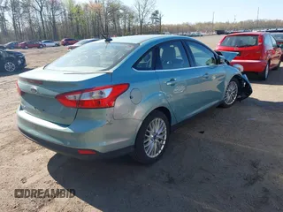 2012 Ford Focus SEL with VIN 1FAHP3H25CL172958, listed as a IAAI auction lot 41961889 with 135,052 mi miles. Bid and sale history available at carsss.com. Image 4.