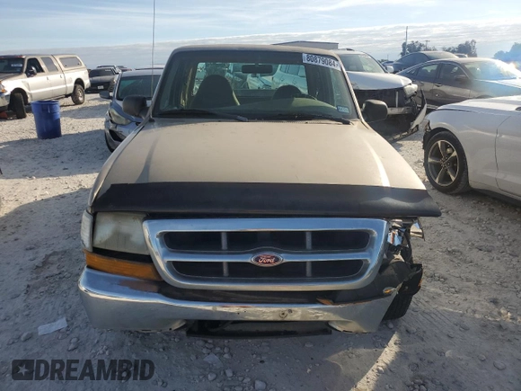 1999 Ford Ranger XLT with VIN 1FTYR14X1XPB75400, listed as a Copart auction lot 80879084 with 255,136 mi miles and Salvage Title. Bid and sale history available at DreamBid. Image 5.