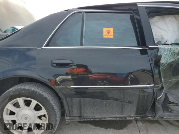 2010 Cadillac DTS 1SA z VIN 1G6KA5EY1AU116600, wystawiony jako Copart lot #71453974 z przebiegiem 111 626 mil mil oraz Szkoda całkowita • Salvage title. Historia ofert i sprzedaży dostępna na DreamBid. Obrazek 10.