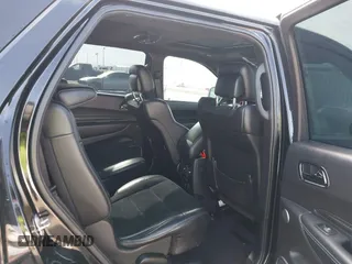 2019 Dodge Durango SRT with VIN 1C4SDJGJ2KC550562, listed as a IAAI auction lot 41549390 with 51,217 mi miles and . Bid and sale history available at DreamBid. Image 8.