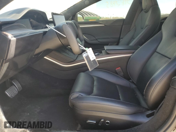 2021 Tesla Model S Plaid with VIN 5YJSA1E63MF451391, listed as a Copart auction lot 54821985 with 50,480 mi miles and Salvage title. Bid and sale history available at DreamBid. Image 7.