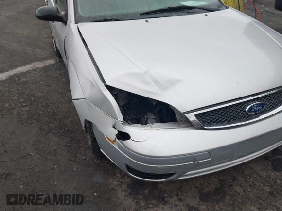 2007 Ford Focus S with VIN 1FAFP34N07W170563, listed as a IAAI auction lot 42001087 with 87,526 mi miles and . Bid and sale history available at carsss.com. Image 6.