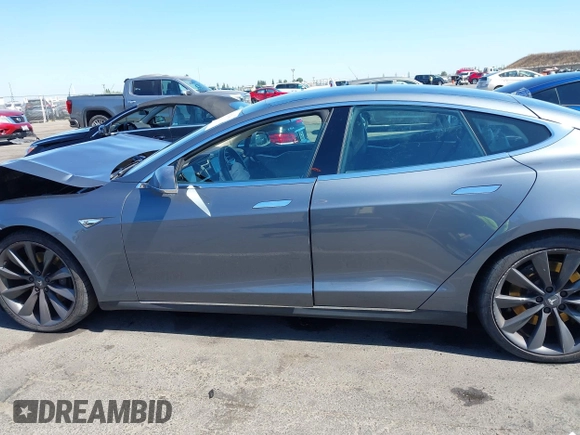 2014 Tesla Model S 60 with VIN 5YJSA1H19EFP36971, listed as a IAAI auction lot 42525811 with Not provided miles and . Bid and sale history available at DreamBid. Image 15.