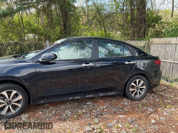 2022 Kia Rio S with VIN 3KPA24AD9NE431636, listed as a IAAI auction lot 42200323 with 36,309 mi miles and . Bid and sale history available at carsss.com. Image 2.