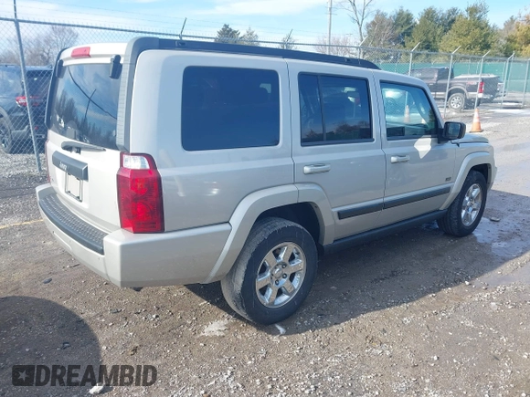 2007 Jeep Commander Sport z VIN 1J8HG48KX7C669647, wystawiony jako IAAI lot #41607617 z przebiegiem 333 861 mil mil oraz . Historia ofert i sprzedaży dostępna na DreamBid. Obrazek 4.