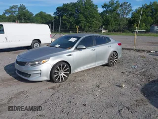 2016 Kia Optima LX with VIN 5XXGT4L30GG065152, listed as a IAAI auction lot 42556909 with 161,798 mi miles and . Bid and sale history available at DreamBid. Image 2.