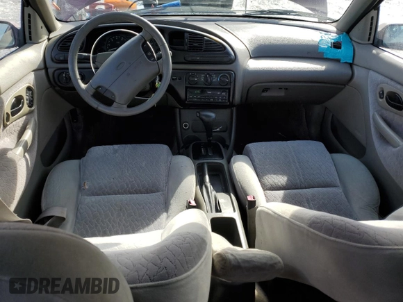 1998 Ford Contour LX with VIN 1FAFP66L4WK261970, listed as a Copart auction lot 42735485 with 106,450 mi miles and Salvage title. Bid and sale history available at DreamBid. Image 8.