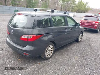 2014 Mazda 5 Sport with VIN JM1CW2BL7E0171690, listed as a IAAI auction lot 42048668 with 196,775 mi miles and . Bid and sale history available at carsss.com. Image 4.
