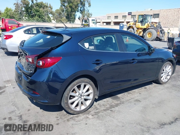 2017 Mazda 3 Touring with VIN 3MZBN1L77HM140562, listed as a IAAI auction lot 42761296 with 76,987 mi miles and . Bid and sale history available at DreamBid. Image 4.
