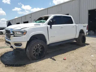 2021 Ram 1500 Laramie z VIN 1C6SRFJTXMN719184, wystawiony jako Copart lot #57024995 z przebiegiem 70 194 mil mil oraz Nie do naprawy • Non repairable. Historia ofert i sprzedaży dostępna na DreamBid. Obrazek 1.
