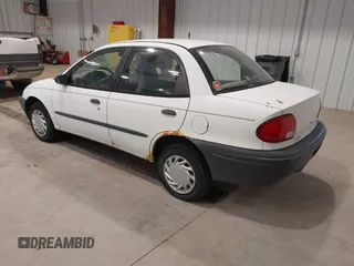 1996 Geo Metro z VIN 2C1MR529XT6777469, wystawiony jako IAAI lot #41392706 z przebiegiem 353 287 mil mil oraz . Historia ofert i sprzedaży dostępna na DreamBid. Obrazek 3.