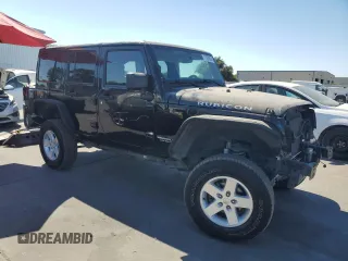 2013 Jeep Wrangler Unlimited Rubicon 10th Anniversary with VIN 1C4HJWFG4DL550832, listed as a Copart auction lot 71633684 with 60,759 mi miles and Salvage title. Bid and sale history available at DreamBid. Image 4.