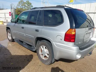 2005 GMC Envoy SLE with VIN 1GKDS13S252284455, listed as a IAAI auction lot 41455172 with 171,559 mi miles. Bid and sale history available at carsss.com. Image 3.