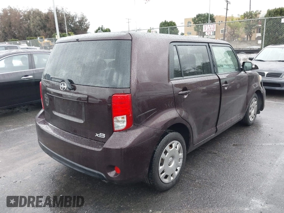 2015 Scion xB with VIN JTLZE4FE7FJ068936, listed as a IAAI auction lot 41565886 with 94,671 mi miles. Bid and sale history available at carsss.com. Image 4.