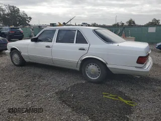 1990 Mercedes-Benz 560 with VIN WDBCA39E8LA536590, listed as a Copart auction lot 76843244 with 231,703 mi miles and Non Repairable. Bid and sale history available at DreamBid. Image 2.