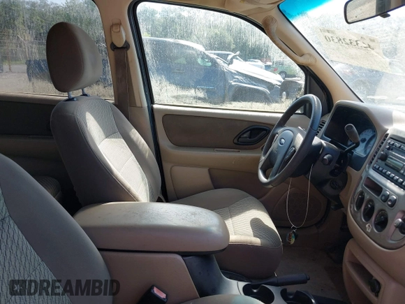 2004 Ford Escape XLT with VIN 1FMYU03114DA07741, listed as a IAAI auction lot 42332830 with 210,556 mi miles and . Bid and sale history available at DreamBid. Image 5.