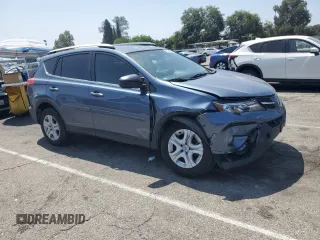 2014 Toyota RAV4 LE with VIN JTMZFREV0ED031618, listed as a Copart auction lot 63344265 with 154,336 mi miles and Salvage title. Bid and sale history available at DreamBid. Image 4.