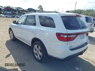 2014 Dodge Durango Limited with VIN 1C4RDJDGXEC323129, listed as a IAAI auction lot 42318727 with 148,451 mi miles and . Bid and sale history available at DreamBid. Image 3.