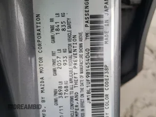 2011 Mazda 3 i Sport with VIN JM1BL1UF9B1454040, listed as a Copart auction lot 46324535 with 118,082 mi miles and Clean Title. Bid and sale history available at DreamBid. Image 12.