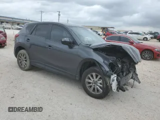 2016 Mazda CX-5 Touring with VIN JM3KE2CY9G0899787, listed as a Copart auction lot 50790365 with 31,294 mi miles and Salvage Title. Bid and sale history available at carsss.com. Image 4.