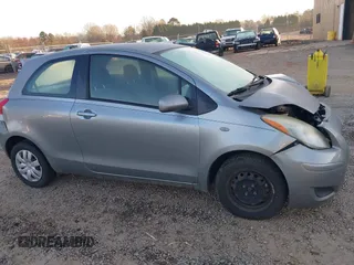 2009 Toyota Yaris with VIN JTDJT903495243871, listed as a IAAI auction lot 41753770 with 189,944 mi miles and . Bid and sale history available at DreamBid. Image 13.