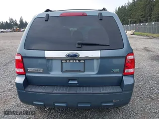 2010 Ford Escape Limited with VIN 1FMCU9EG1AKB89593, listed as a IAAI auction lot 41993888 with 121,175 mi miles. Bid and sale history available at carsss.com. Image 16.