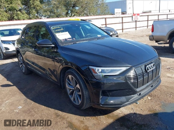 2021 Audi e-tron Premium Plus with VIN WA1LAAGE4MB010570, listed as a IAAI auction lot 41398464 with 67,721 mi miles. Bid and sale history available at carsss.com. Image 1.