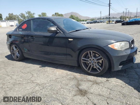 2011 BMW 1 Series 135i with VIN WBAUC9C59BVM10528, listed as a Copart auction lot 61499025 with 160,557 mi miles and Salvage title. Bid and sale history available at DreamBid. Image 4.