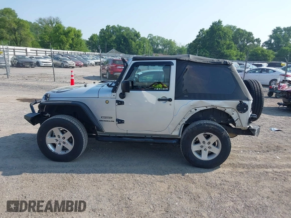2012 Jeep Wrangler Sport z VIN 1C4AJWAG9CL255278, wystawiony jako IAAI lot #42469091 z przebiegiem 140 480 mil mil oraz . Historia ofert i sprzedaży dostępna na DreamBid. Obrazek 15.