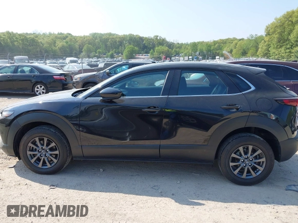 2021 Mazda CX-30 S with VIN 3MVDMBAL6MM264948, listed as a IAAI auction lot 42263077 with 13,614 mi miles and . Bid and sale history available at DreamBid. Image 14.